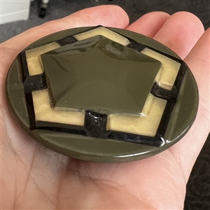 Extra large Vintage celluloid glow button with pentagon.