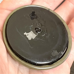 Extra large Vintage celluloid glow button with pentagon.