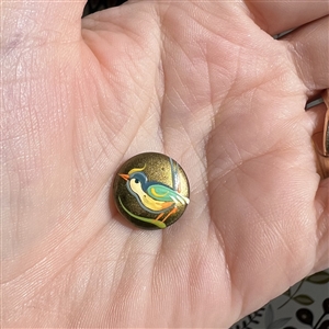 Brooks bird painted casein button. 