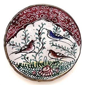 Enamel button of birds in a garden set in silver (?). 