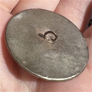Enamel button of birds in a garden set in silver (?). 