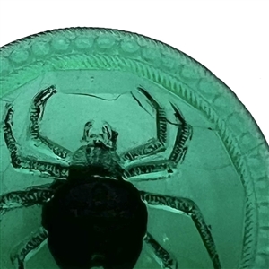 Bohemian aqua glass button of a spider. 