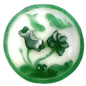 Peking glass button of two koi swimming with water plants.