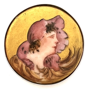 Transfer and painted porcelain of a woman in modern silver setting.