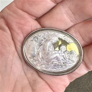 Imitation cameo carved oval glass with iridescent finish of a woman and child.