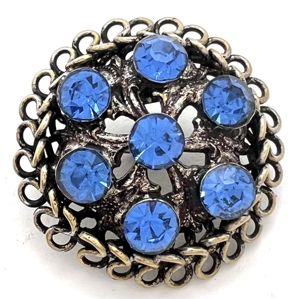 Jewel button with blue faceted pastes set in sterling silver.