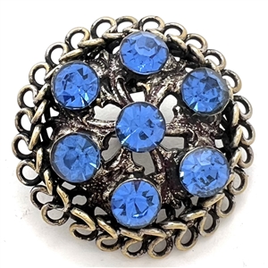Jewel button with blue faceted pastes set in sterling silver.