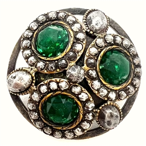 A 19th c. Jewel button with green faceted pastes  and steels set in metal.