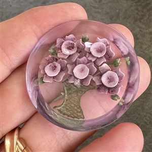 Vintage reverse-carved and painted acrylic button of purple flowers.
