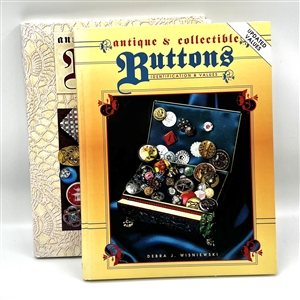 Two button books - “Antique and Collectible Buttons - Identification and Values Volume one and two. 