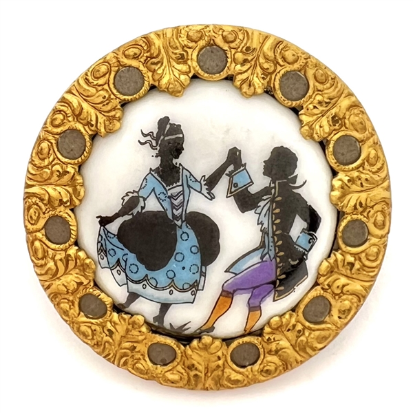 Painted porcelain set in metal button of man and woman dancing. 