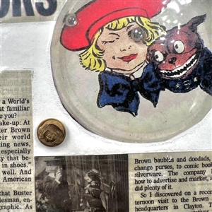 Card of five Buster Brown buttons and memorabilia.
