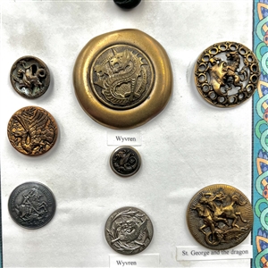 Card of twelve fabulous creature buttons.
