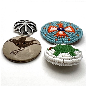 Four Native American buttons. 