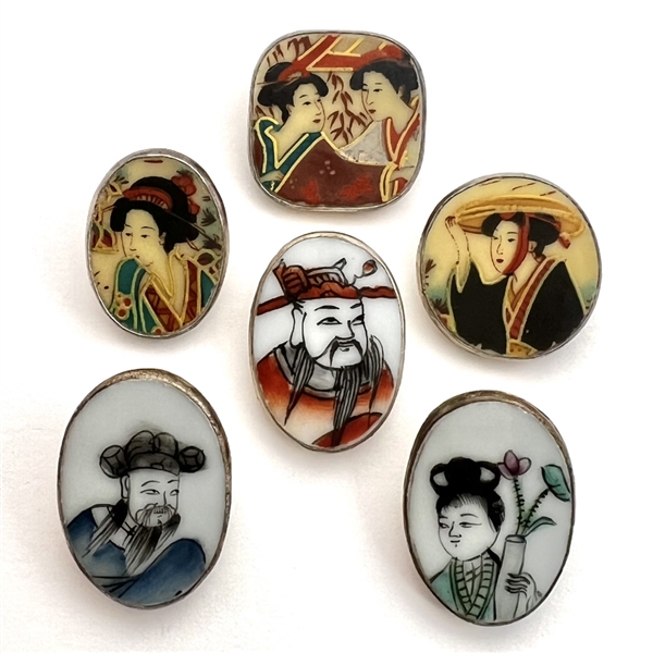 Six Chinese shard ceramic buttons of Asian people.