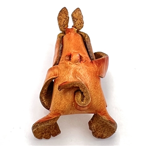 Leather button of a realistic rabbit. 