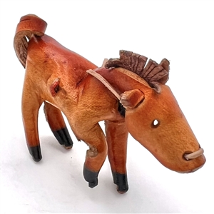 Huge leather button of a realistic horse.