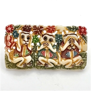 Carved and painted natural material button of See no evil, hear no evil, speak no evil.