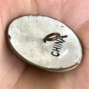 Chinese enamel with counter enamel button of flower.