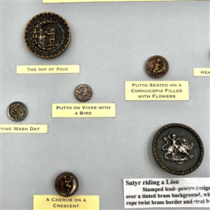 Card of twelve mythological buttons.