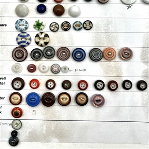Card of sixty nine china buttons. 