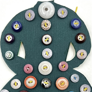 Card of fifty seven china and calico buttons. 