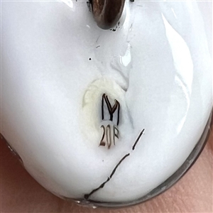 Male and female cardinals - glass studio button by Mary Gaumond.