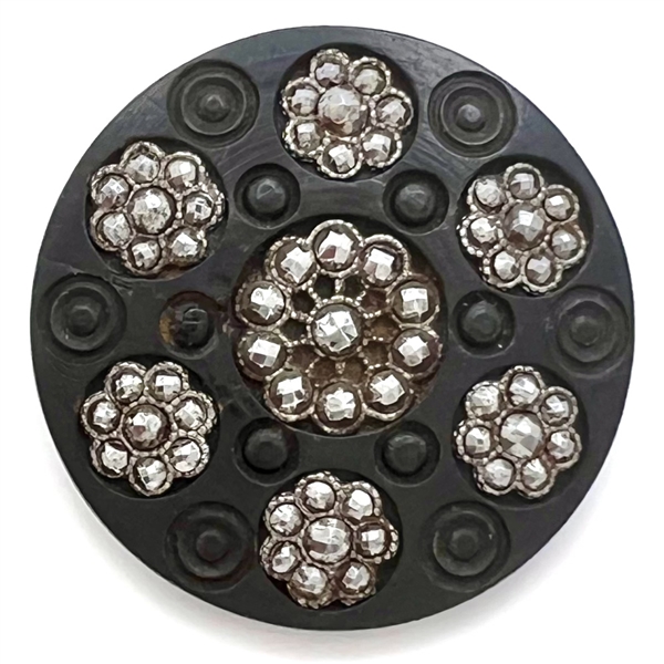 Div I - engine turned bogwood button with faceted steel rosettes.