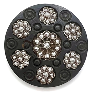 Div I - engine turned bogwood button with faceted steel rosettes.