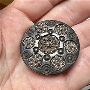 Div I - engine turned bogwood button with faceted steel rosettes.