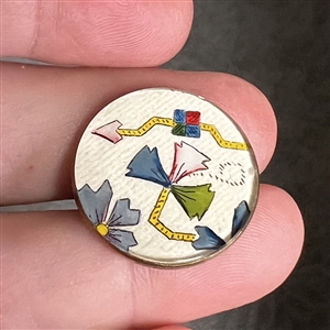 Satin fabric under glass button.