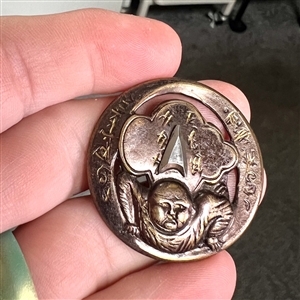 Brass button of “Chinese Tumbler.
