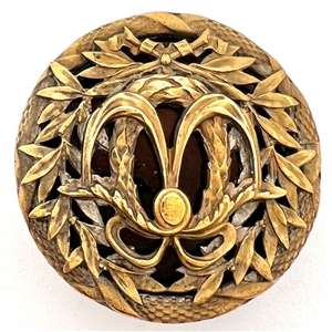 A 19th c. Brass button with an enamel background.