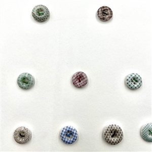 Card of 22 china calico & china buttons.