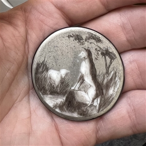 SCARCE monochrome painted porcelain button of “The Wolf and the Lamb.