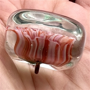 Mary Gaumond's pink carnation glass studio button. 