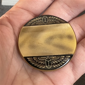 Vintage celluloid tight top button with contour and Egyptian decoration. 