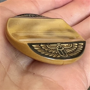 Vintage celluloid tight top button with contour and Egyptian decoration. 