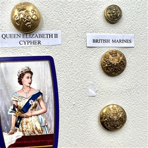 Card of 13 uniform buttons from England and Canada.