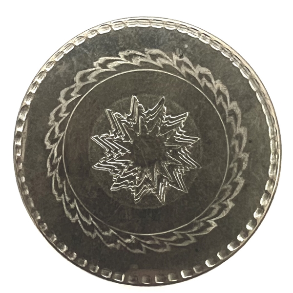 An 18th c. Tombac button.