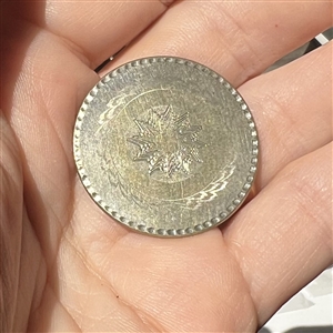 An 18th c. Tombac button.