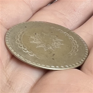An 18th c. Tombac button.