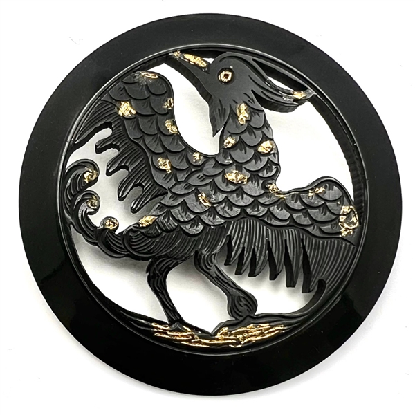 Huge carved casein button of a rooster.