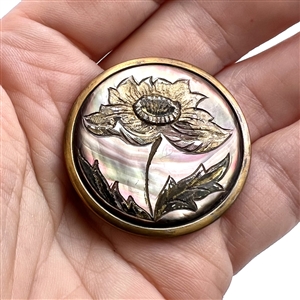 A 19th c. Gilded pearl button of a poppy.
