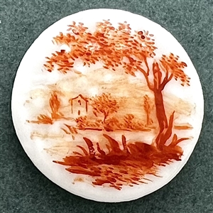 A 19th c. Mennecy porcelain button  of a river scene.