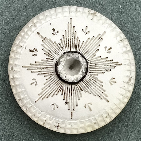 An 18th c. pearl with center star and paste.