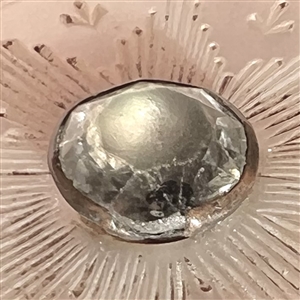 An 18th c. pearl with center star and paste.