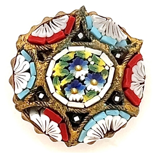 Italian mosaic button with center of flowers.