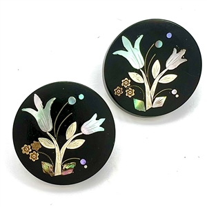 Matched pair of horn buttons with inlay of tulips.