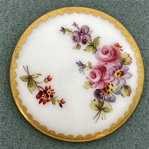 A 19th c. Porcelain button of flowers with Sevres back mark.